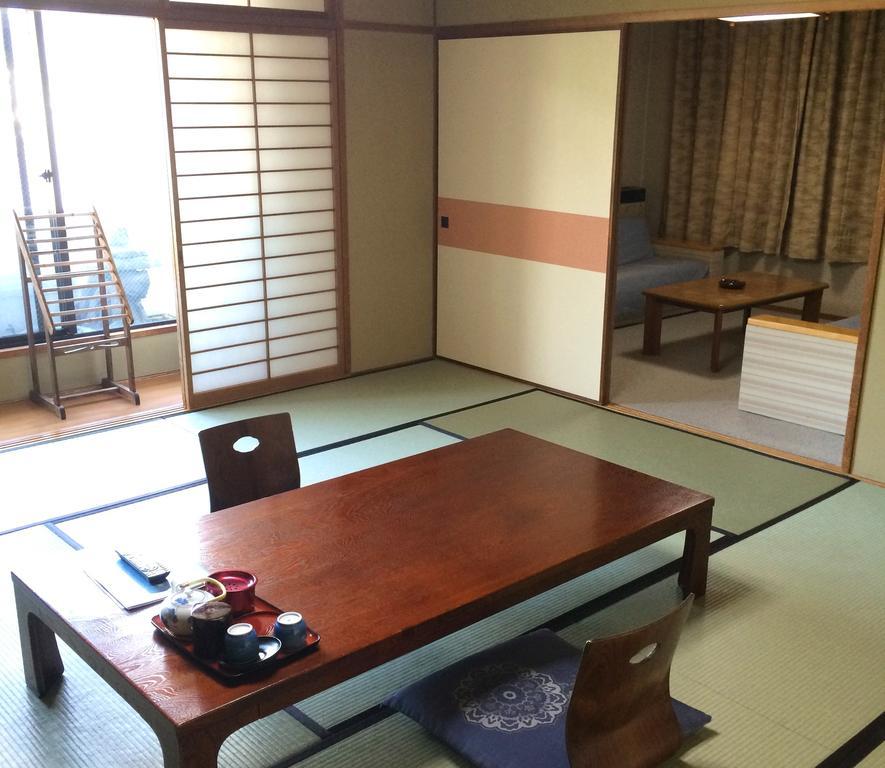 Imakuni Ryokan Takachiho Rom bilde