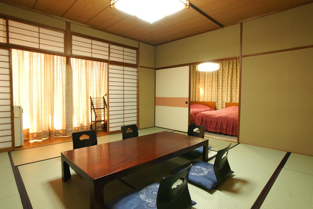 Imakuni Ryokan Takachiho Rom bilde