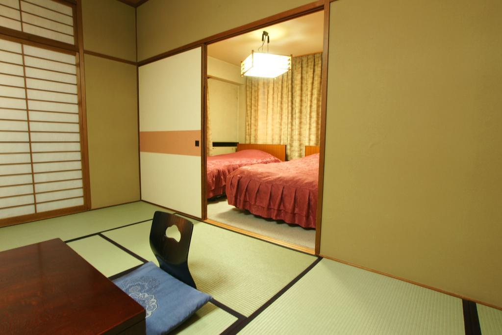 Imakuni Ryokan Takachiho Rom bilde